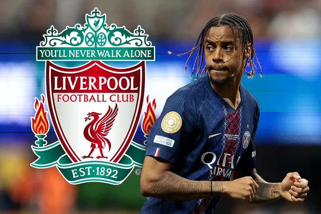 Player in PSG kit with Liverpool logo in background Player in PSG kit with Liverpool logo in background