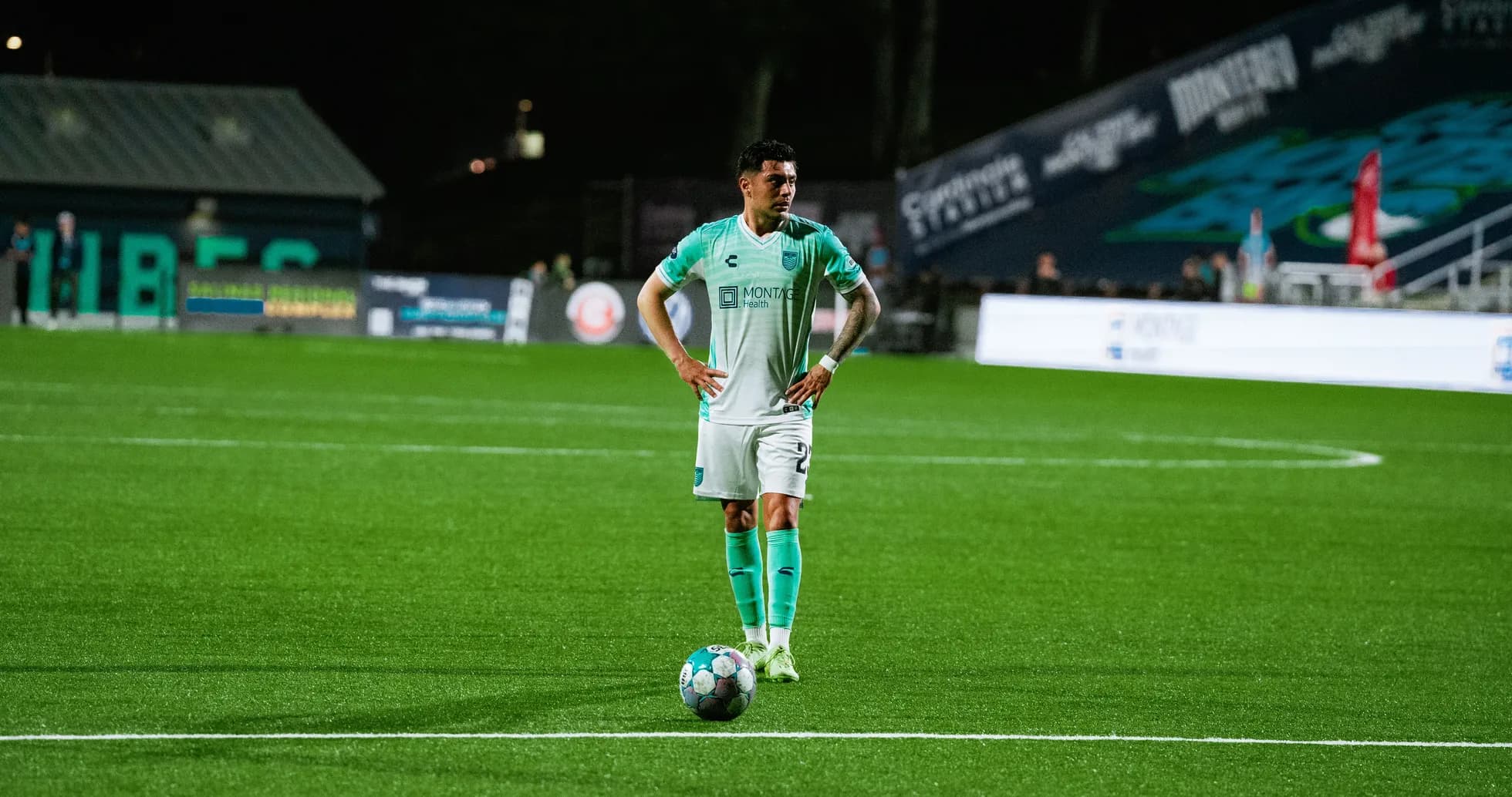 Player preparing for a free kick in football match Player preparing for a free kick in football match
