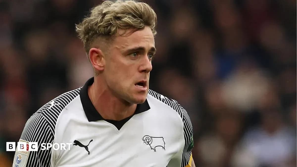 Player in Derby County kit during match action Player in Derby County kit during match action