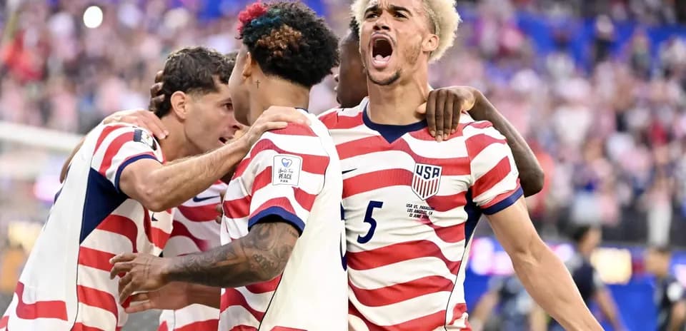 USA players celebrating a goal during World Cup match USA players celebrating a goal during World Cup match