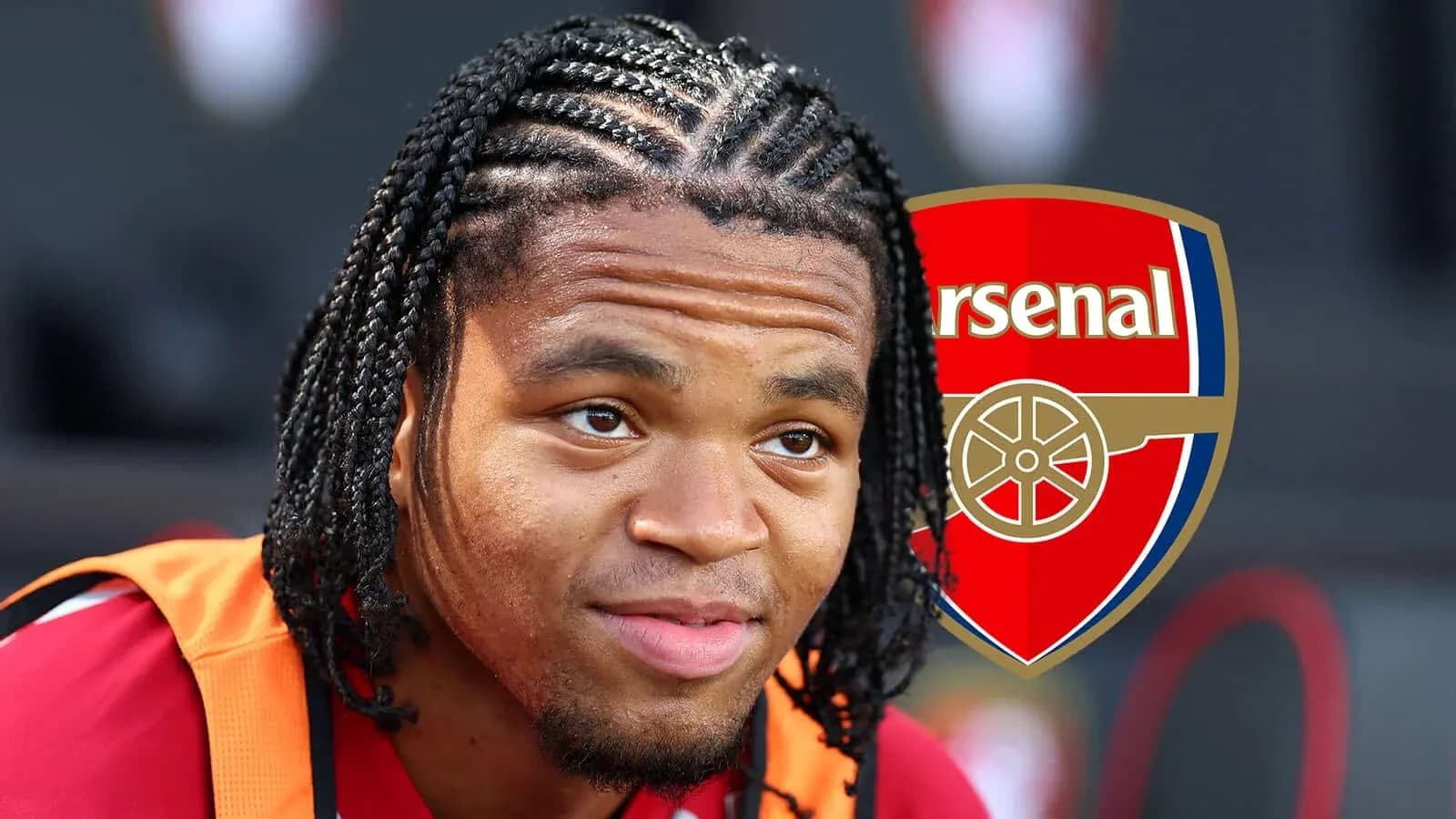 Player in Arsenal jersey with braided hair Player in Arsenal jersey with braided hair