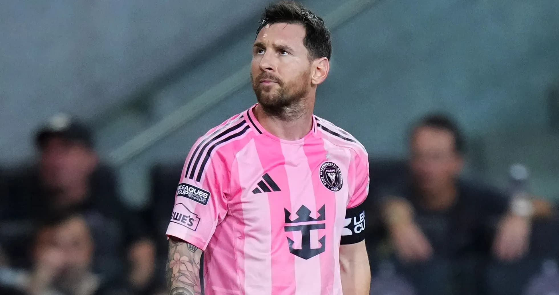 Player in pink jersey during a soccer match Player in pink jersey during a soccer match