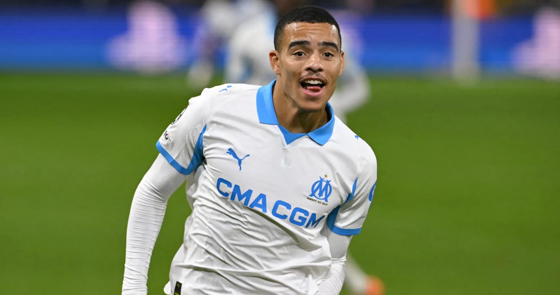 Player celebrating after scoring a goal for Marseille Player celebrating after scoring a goal for Marseille