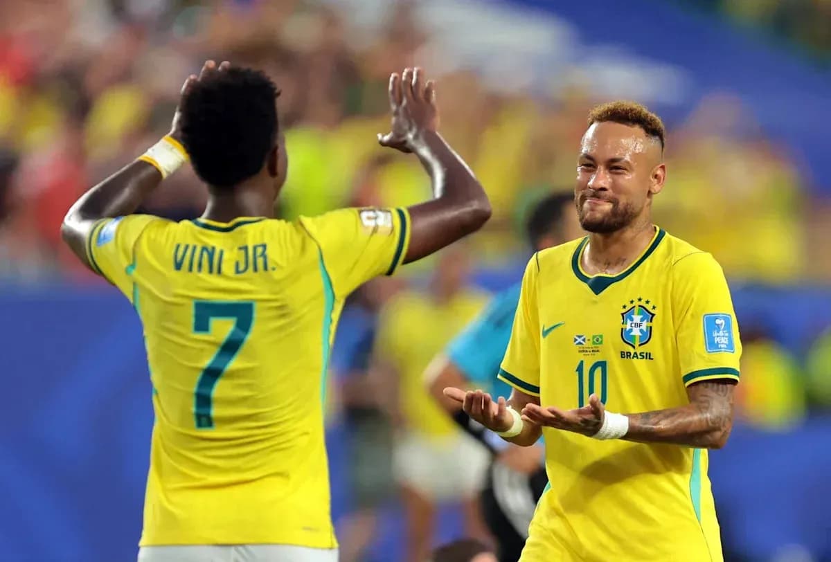 Neymar and Vinicius Jr. celebrating a goal together Neymar and Vinicius Jr. celebrating a goal together