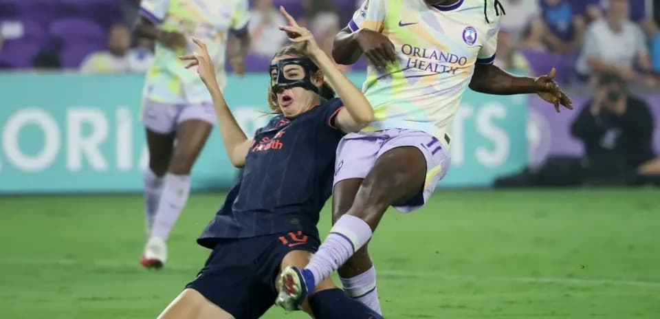Orlando Pride player tackles Bay FC player Orlando Pride player tackles Bay FC player