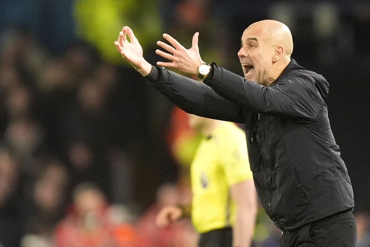 Manager gesturing passionately from the sidelines Manager gesturing passionately from the sidelines