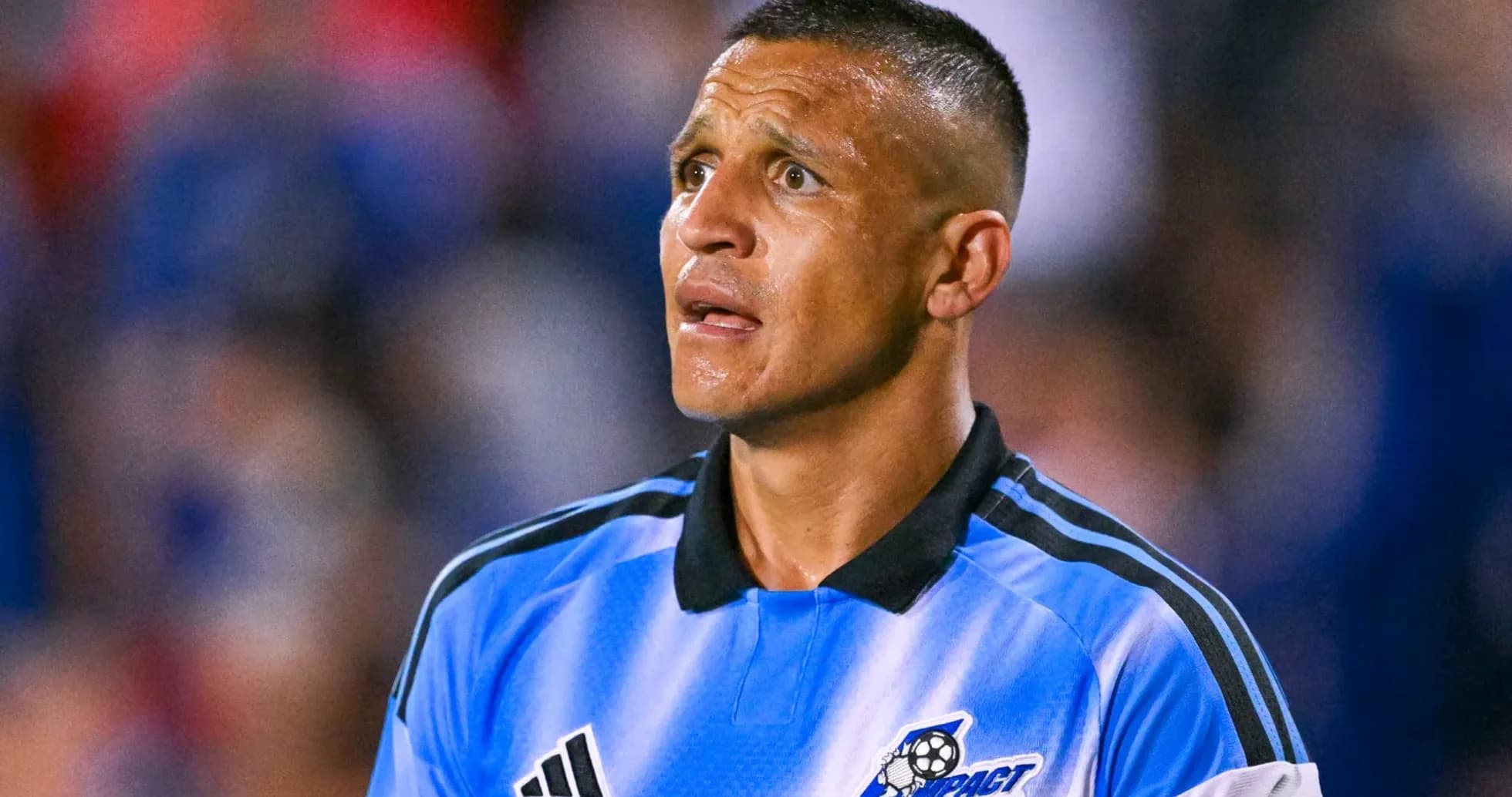 Referee in blue jersey during a soccer match Referee in blue jersey during a soccer match