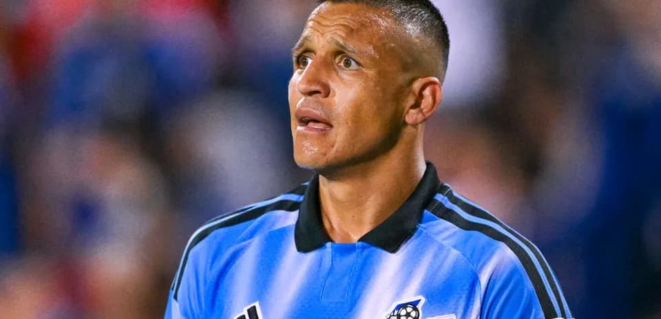 Referee in blue jersey during a soccer match Referee in blue jersey during a soccer match