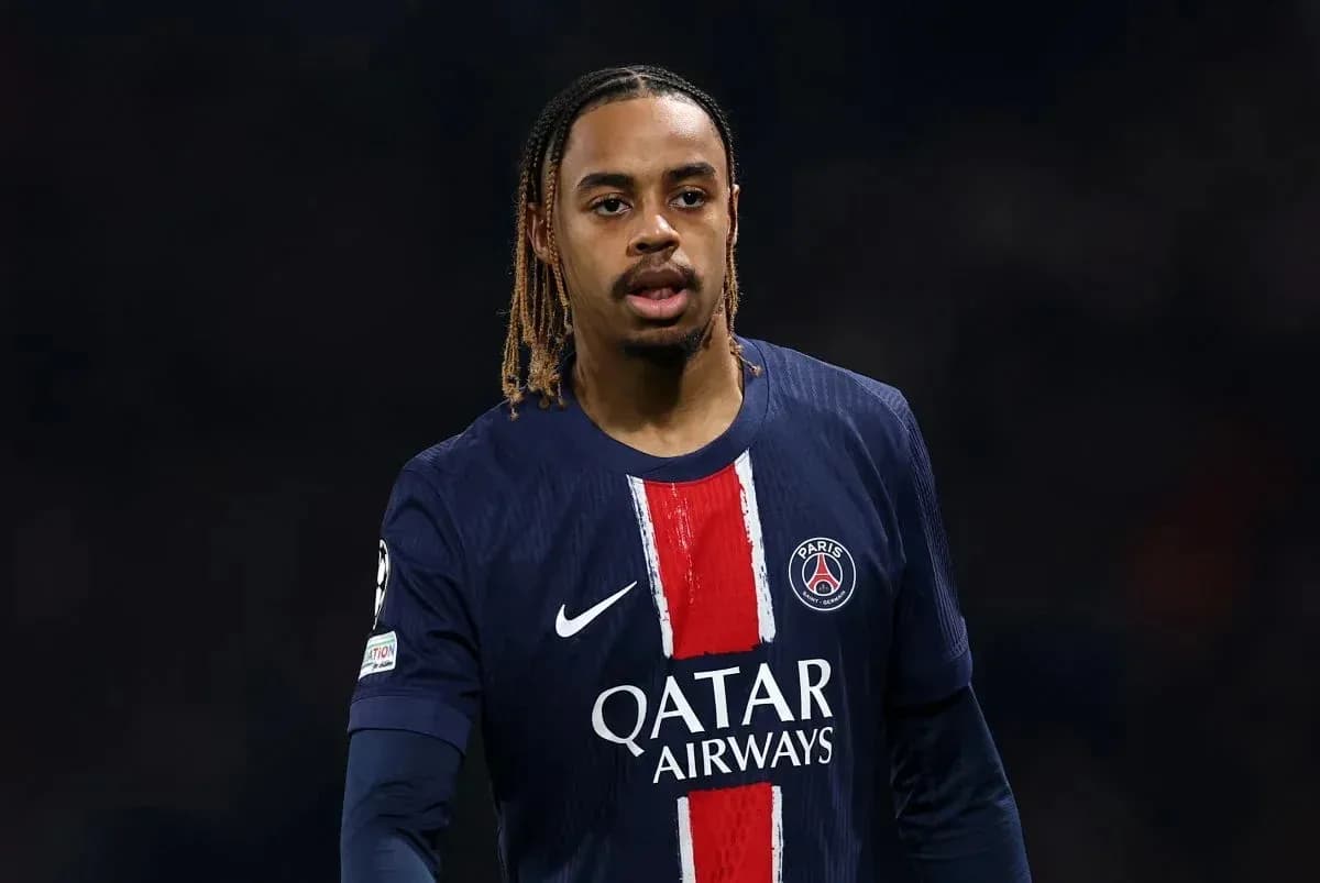Player in PSG jersey during a match Player in PSG jersey during a match