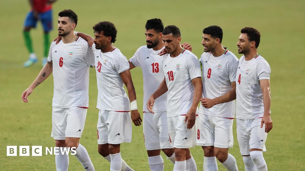 Iranian players celebrating during a football match Iranian players celebrating during a football match