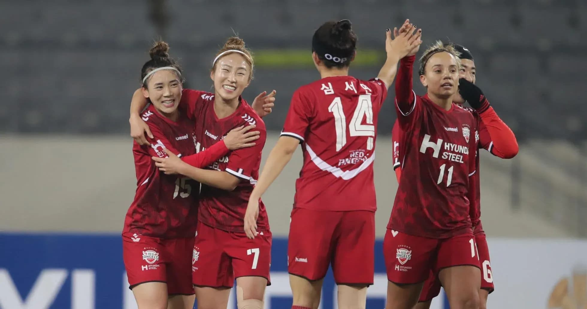 Suwon FMC W players celebrating a goal Suwon FMC W players celebrating a goal