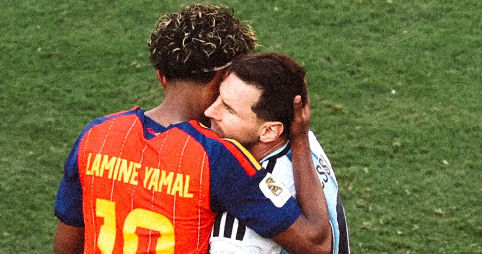 Two players embracing on the football field Two players embracing on the football field